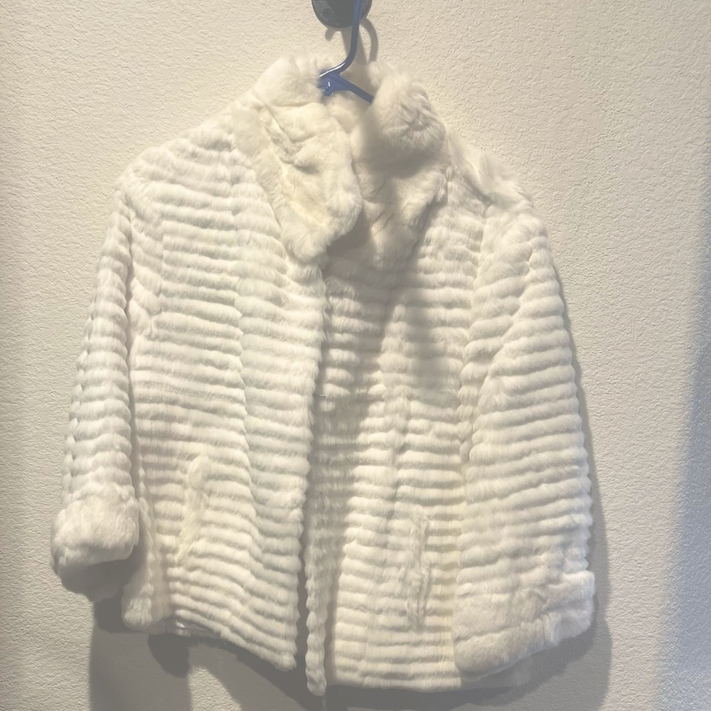 Rabbit fur coat gently used kept in garment bag. Great Christmas present!
